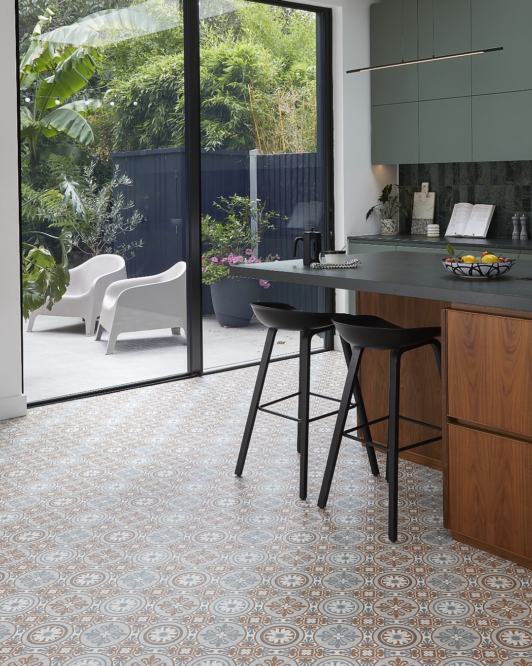 Patterned cushioned vinyl flooring fitted in a modern kitchen-diner