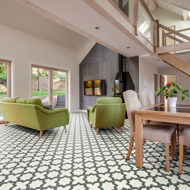 Geometric star-pattern vinyl flooring in an open-plan living and dining room