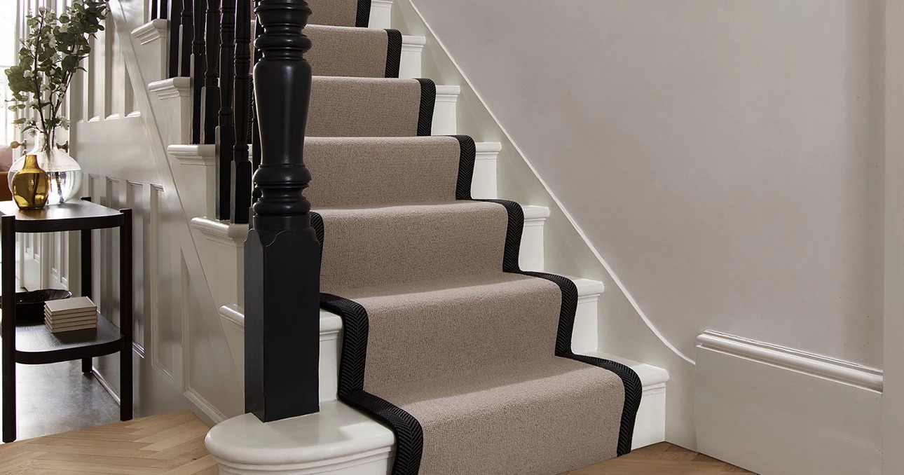 Wool stair runner with herringbone border on a period staircase